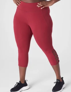 Crops And Capris^Lane Bryant Livi High-Rise Livi Soft Capri Legging - Strappy Hem Rumba Red