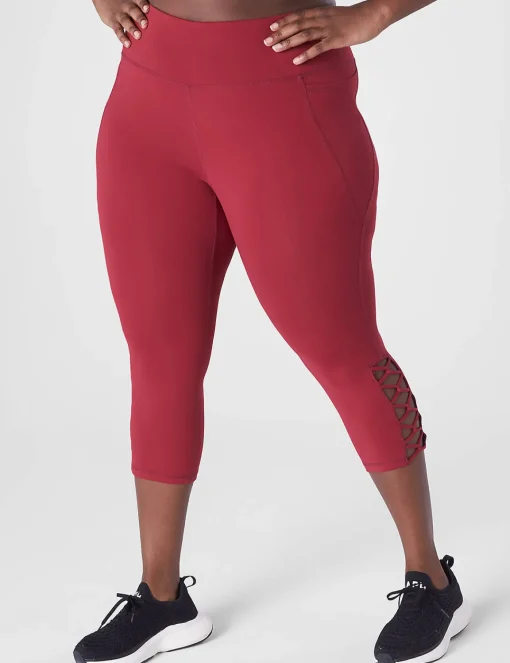 Crops And Capris^Lane Bryant Livi High-Rise Livi Soft Capri Legging - Strappy Hem Rumba Red
